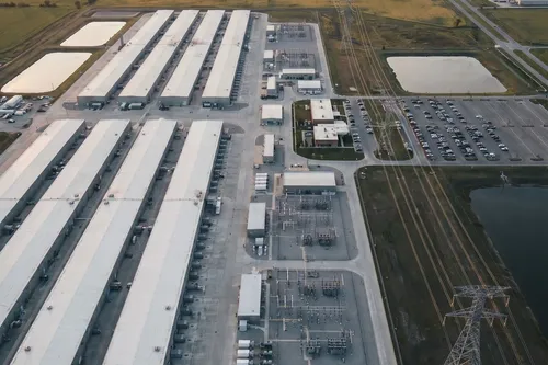 Aerial view of a hyperscale data center complex in Midwestern farmland